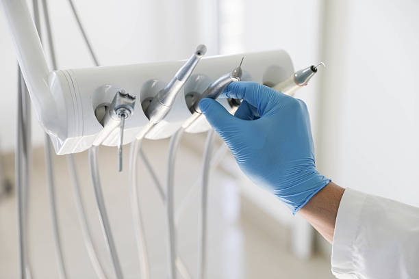 Professional Tooth Extraction technician working in Brazoria, TX